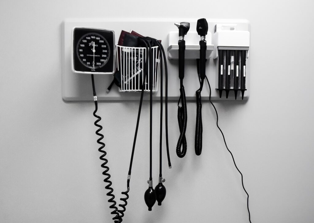 Clinic equipment hanging on the wall with wire and instruments to carry out the menopause procedures